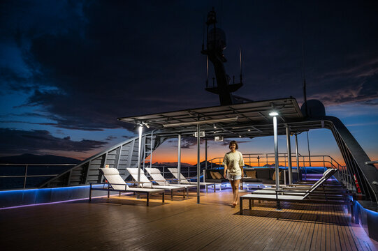sundeck at twilight on luxury motor yacht