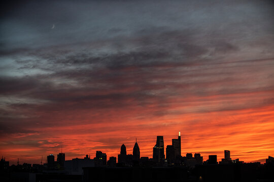 Brilliant sunrise paints a colorful sky over Philly skyline