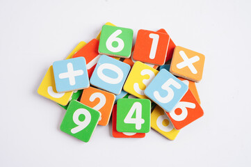 Number wood block cubes for learning Mathematic, education math concept.