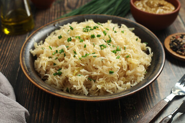 A bowl with traditional German Sauerkraut served in rustic style	