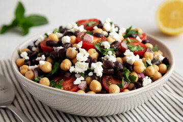 Homemade Chickpea And Black Bean Salad in a Bowl, low angle view. Close-up.