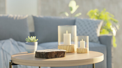 Modern boho interior of living room in cozy apartment. Simple cozy living room interior with white sofa, decorative pillows, wooden table with candles and natural decorations
