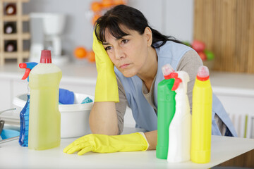 mature woman tired after house chores