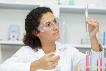 a woman testing formule liquid