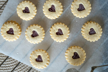 Traditional swiss cookies called Spitzbuben filled with jam.