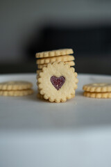 Traditional swiss cookies called Spitzbuben filled with jam.