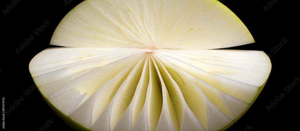 Wall mural a copy space image of a white isolated sliced apple