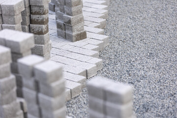 Process of building new path made from concrete blocks, interlocking pave