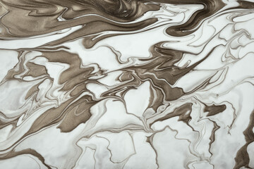 Abstract fluid art background brown and white colors. Liquid marble. Acrylic painting with umber...