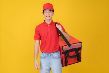 Cheerful delivery man holding insulated food bag