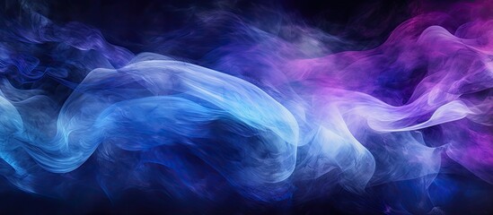 Fototapeta premium An artistic representation of paint swirls in shades of blue and purple against a dark abstract background Copy space image