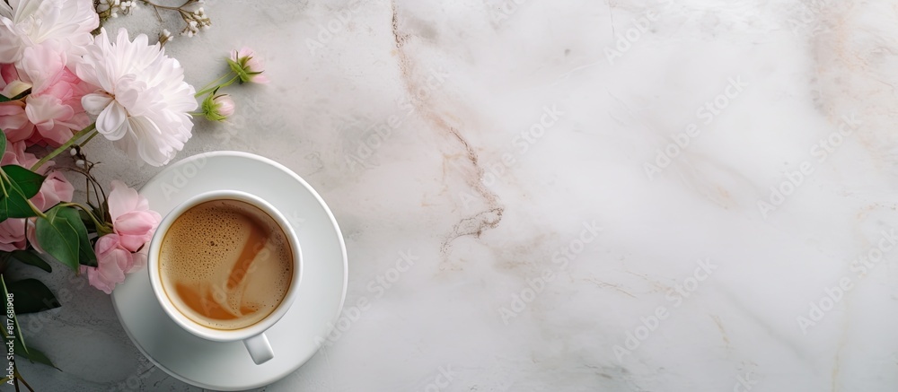 Aufkleber a top down view of a steaming cup of coffee placed on a marble table along with a handmade coffee cu