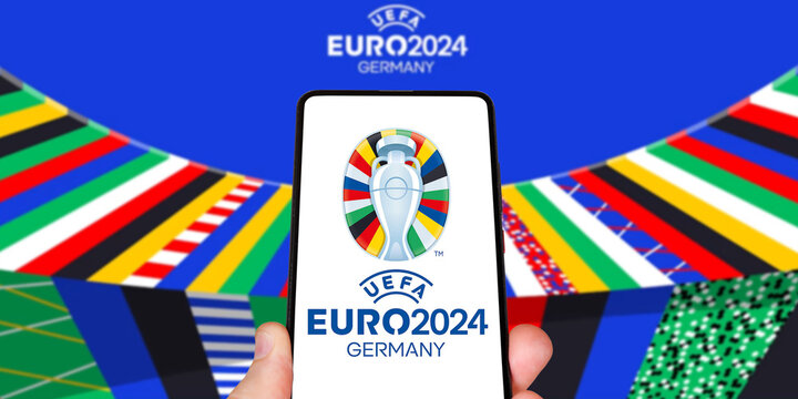 UEFA Euro 2024 Germany European Football Championship Europe logo on a mobile photomontage in Germany
