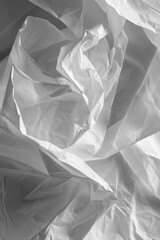 Obraz premium An abstract image of crumpled fabric, with folds and creases creating interesting textures and shadows.