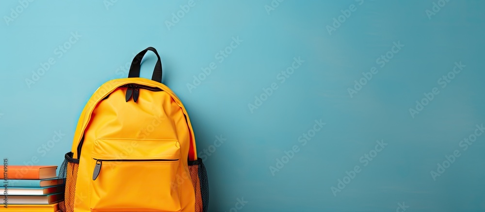 Aufkleber school bag with school supplies on a background ample space available for adding text