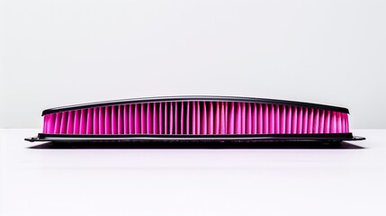 Vibrant pink automotive air filter on a clean white background - essential engine maintenance part