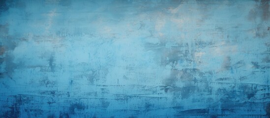 Obraz premium The designer s background is a copy space image of faded blue paint