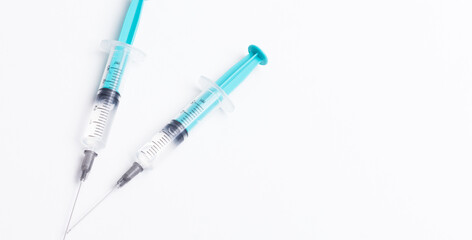 Disposable plastic syringe prepared for injection and vaccination in the hospital. The concept of medicine and health
