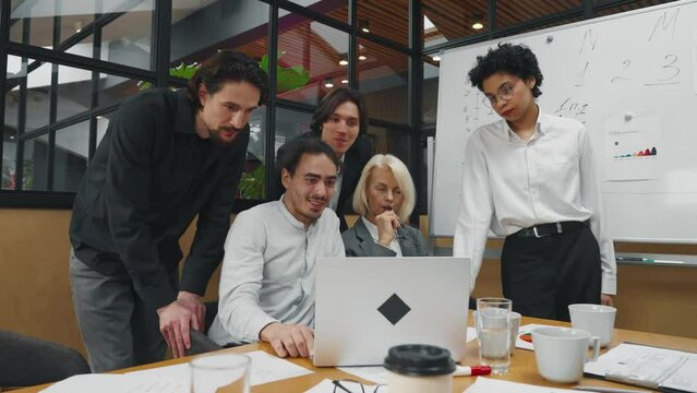 Director accepts work from employees. A woman CEO leader of company reviews the work from employees, solving a problem in board meeting room. Office job, stressed situation, report presentation.