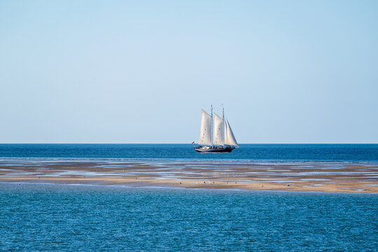Tall ship white sails blue ocean sea, schooner brig history historic maritime, romantic adventure, copy space