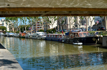 Canal of the Robine (canal de la Robine) and bridge at Narbonne, town located in the Aude...