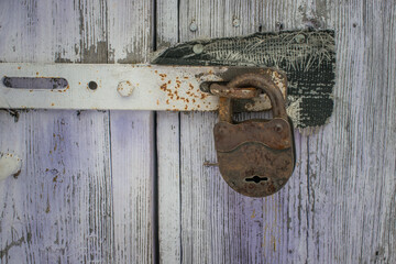 Old lock on wood door