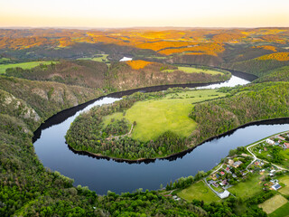 Aerial view of the Solenice Horseshoe Bend on the Vltava River in Czechia, showcasing the winding...