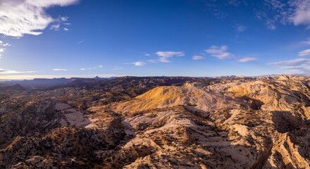 aerial panorama of the yellow rock formation in utah