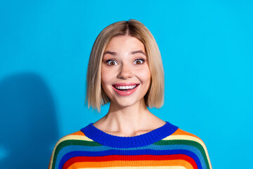 Portrait of pretty young girl open mouth wear striped pullover isolated on blue color background