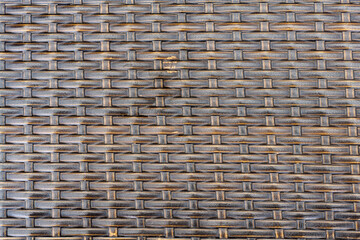 Overhead close-up shot of a wooden table top featuring a unique decorative pattern.