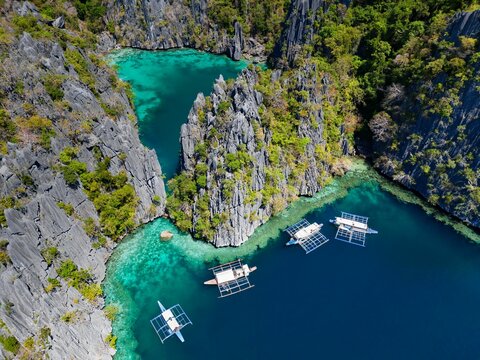 Aerial view of boats at Twin Lagoon, Coron Island, Philippines
