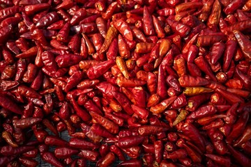 Top view of red chili peppers in a stack