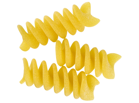 Spiral - shaped uncooked Italian Pasta isolated on a transparent background. Top view. Extreme macro.