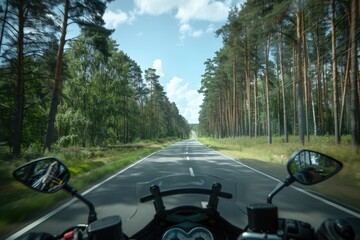 Motorcycle driving down road near forest, perfect for travel and adventure concepts