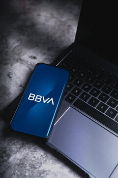 M&Aacute;LAGA - SPAIN - MAY 14, 2024: Smartphone with bank BBVA logo on screen. Spanish banking group.