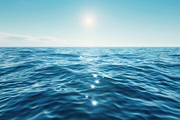 Fototapeta premium A serene image of a large body of water with the sun shining in the sky. Perfect for nature and travel concepts