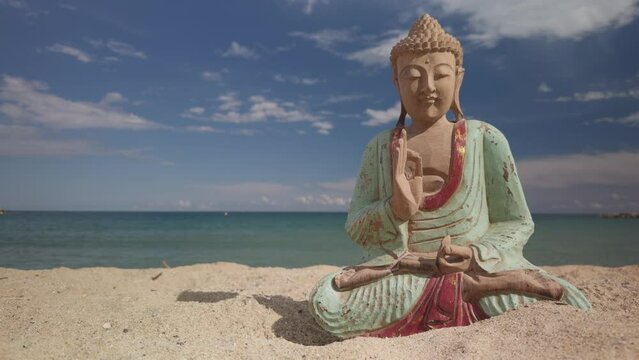 buddha statue on a beach