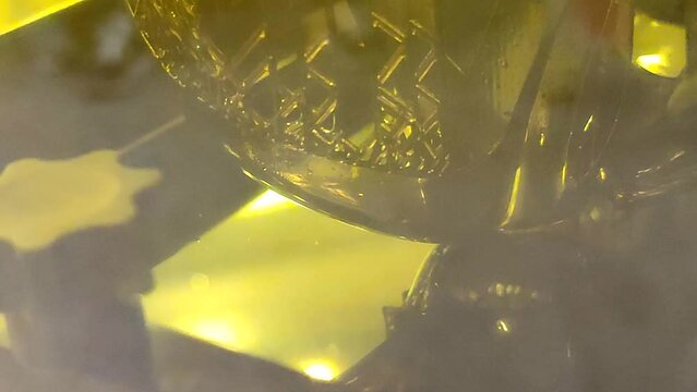 3D printer working process. 3D printing. Stereolithography photopolymerization SLA. Additive manufacturing technology. Liquid materials, hard part, creating layers. 3D model ultraviolet polymerization