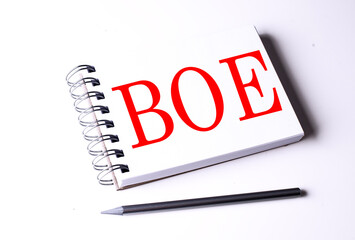 BOE word on notebook on white background