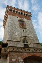 Statue of Florian at Saint Florian Gate in Krakow, Poland