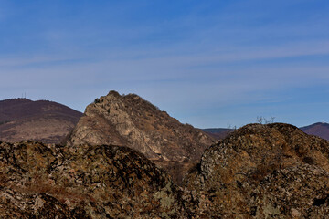Rocky mountain peak against the backdrop of a blue sky. Birtvisi Canyon, Georgia