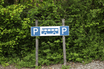 Parking area for buses or tourist vehicles in the forest. Bus parking sign