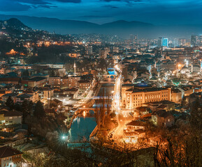 The picturesque cityscape of Sarajevo bathed in the soft glow of twilight invites travelers to...