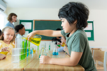 Obraz premium Teacher and students, Learn and experiment with science in a school science classroom.