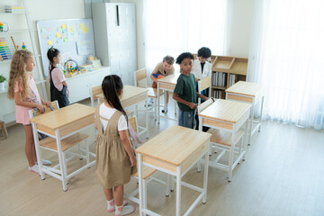 Teacher and students, In the morning to begin learning and studying in a classroom of school.