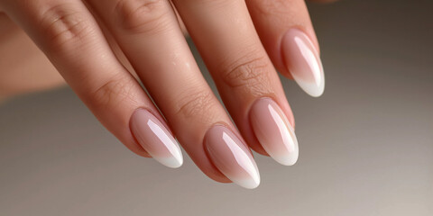 A woman's hands with long, painted nails