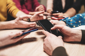 Group of friends using smartphones - social media interaction - digital connection - technology...
