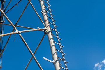 technical ladder for galvanized steel truss anchored to the reticular structure of a repeater...