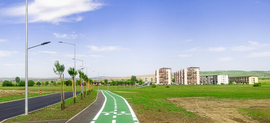 a new neighborhood in the city with a road and a bike path, sibiu city, romania