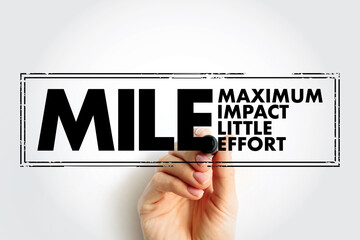 MILE - Maximum impact little effort acronym text stamp, business concept background